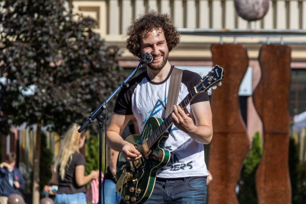 The Human Computers performing in the street