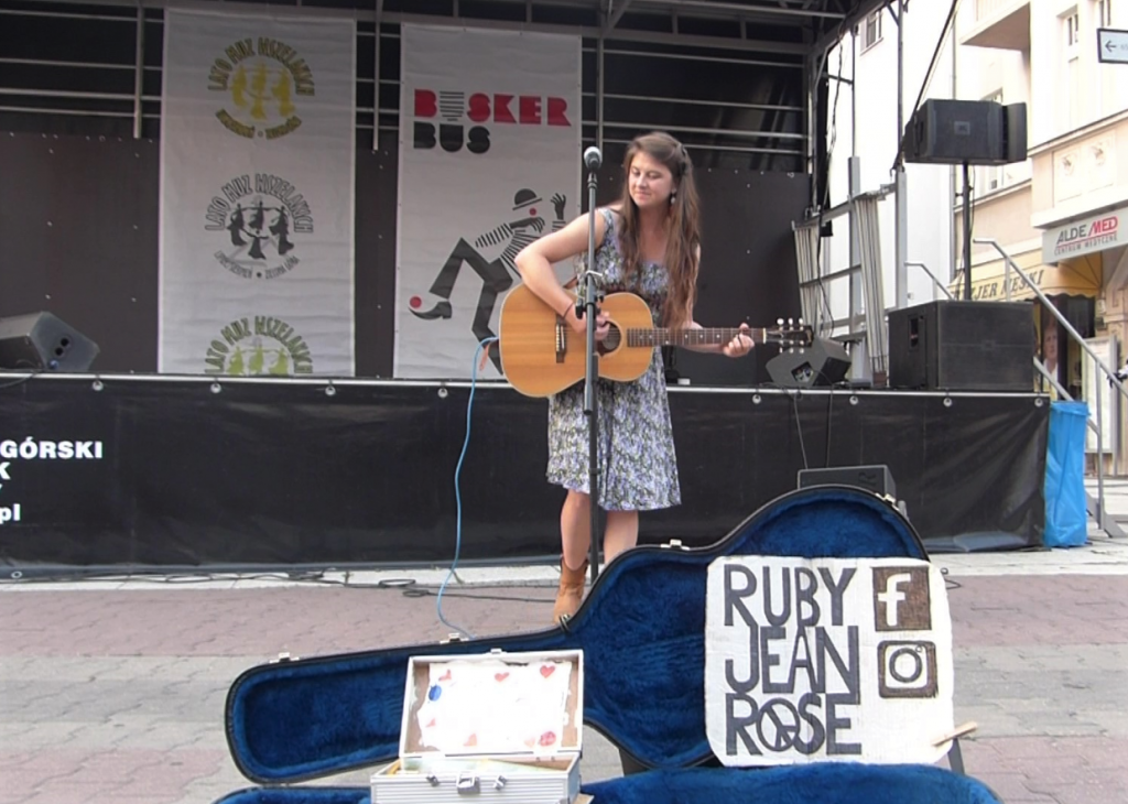 Street musician Ruby Jean Rose performing in Zielona Góra