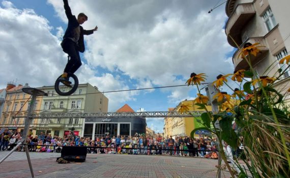Sam Goodburn unicycling across a tightrope