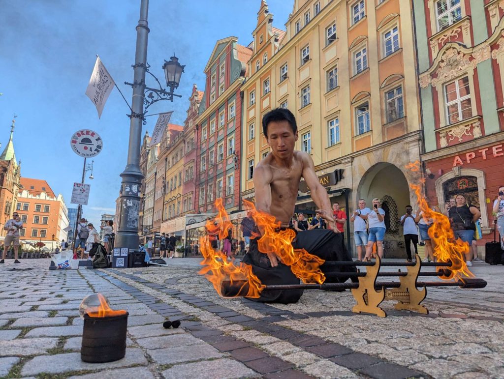 Street performer Kuo Chien Hung during fire show in Wrocław