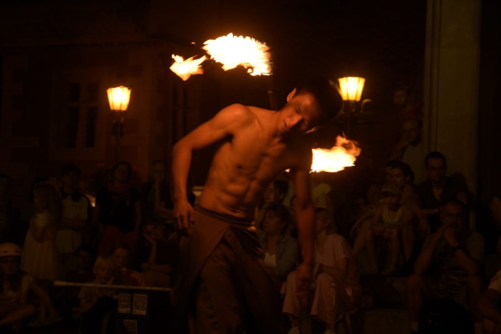 Busker Kuo Chien Hung during fire show at Busker Tour 