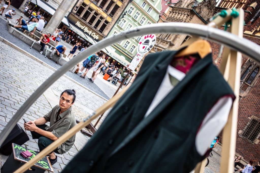 Street performer Alvin Yong before the show at Busker Tour 2023 in the square in Wrocław 